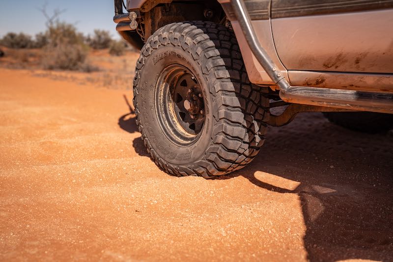 BFGoodrich mud-terrain tyre on red outback sand — tyre pressure matters on corrugated roads